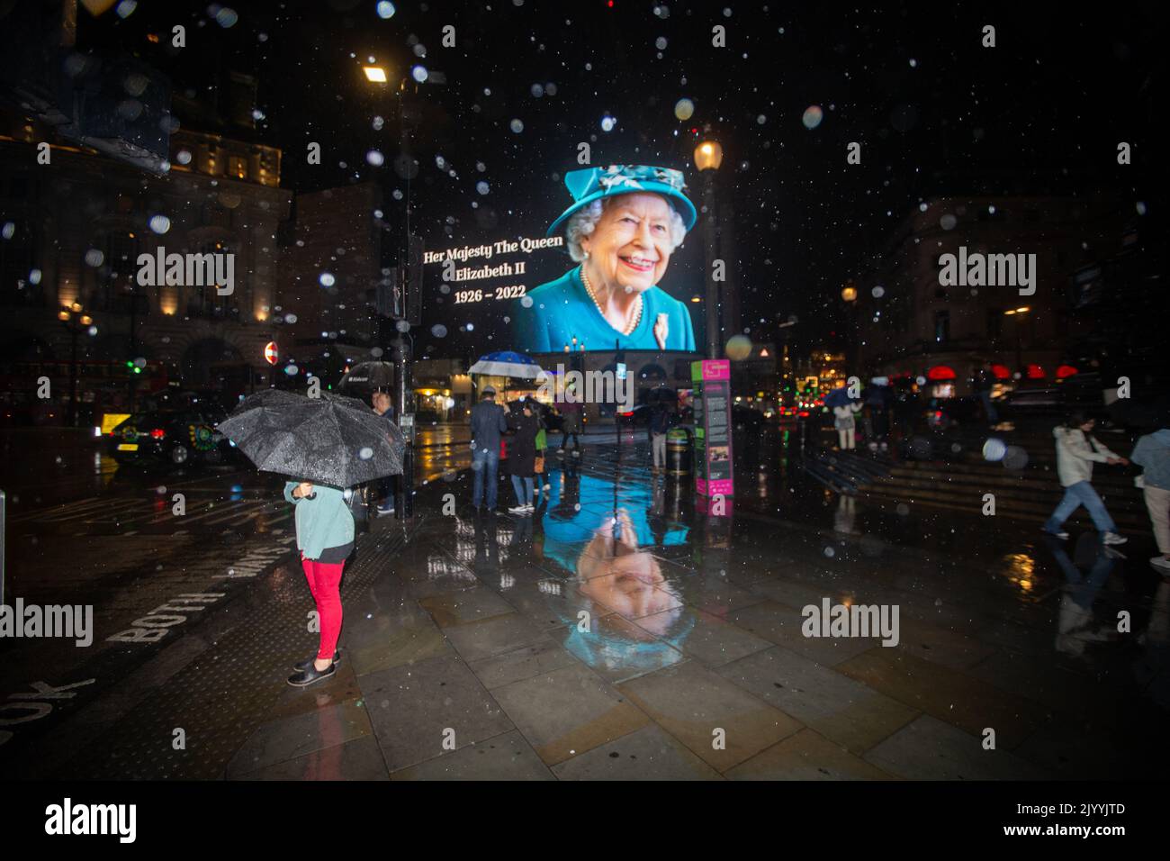 London, England, UK. 8th Sep, 2022. A tributet to Queen Elizabeth II is on display on giant screen in Piccadilly Circus after her death announcement. (Credit Image: © Tayfun Salci/ZUMA Press Wire) Stock Photo