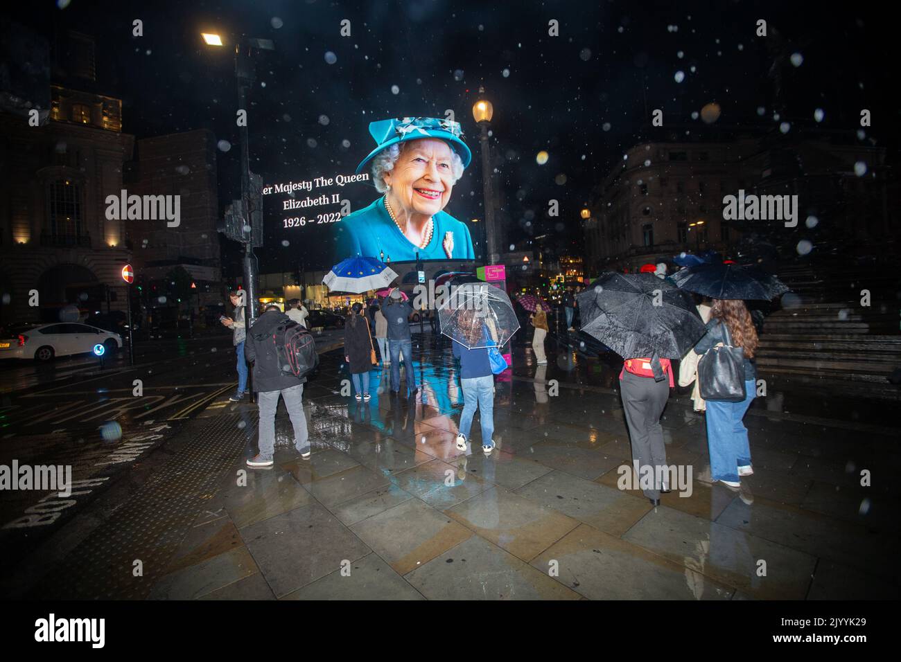 London, England, UK. 8th Sep, 2022. A tributet to Queen Elizabeth II is on display on giant screen in Piccadilly Circus after her death announcement. (Credit Image: © Tayfun Salci/ZUMA Press Wire) Stock Photo