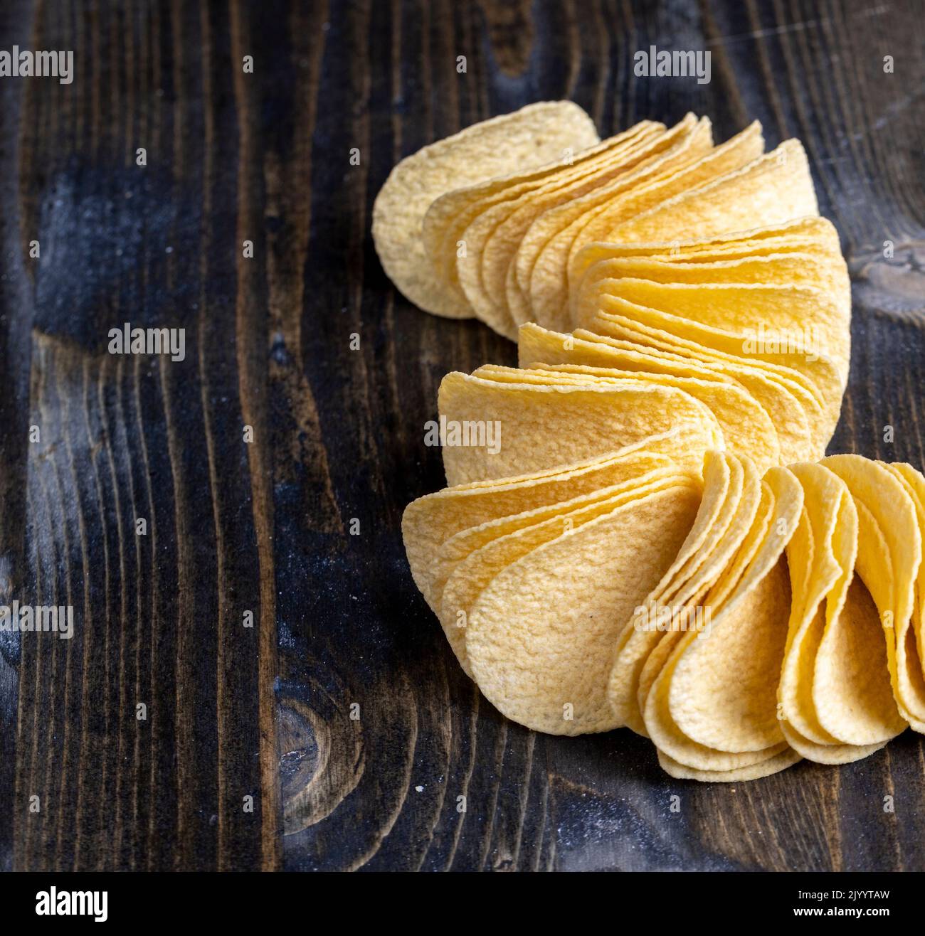 Crispy potato chips fried with spices, a bunch of potato chips ready