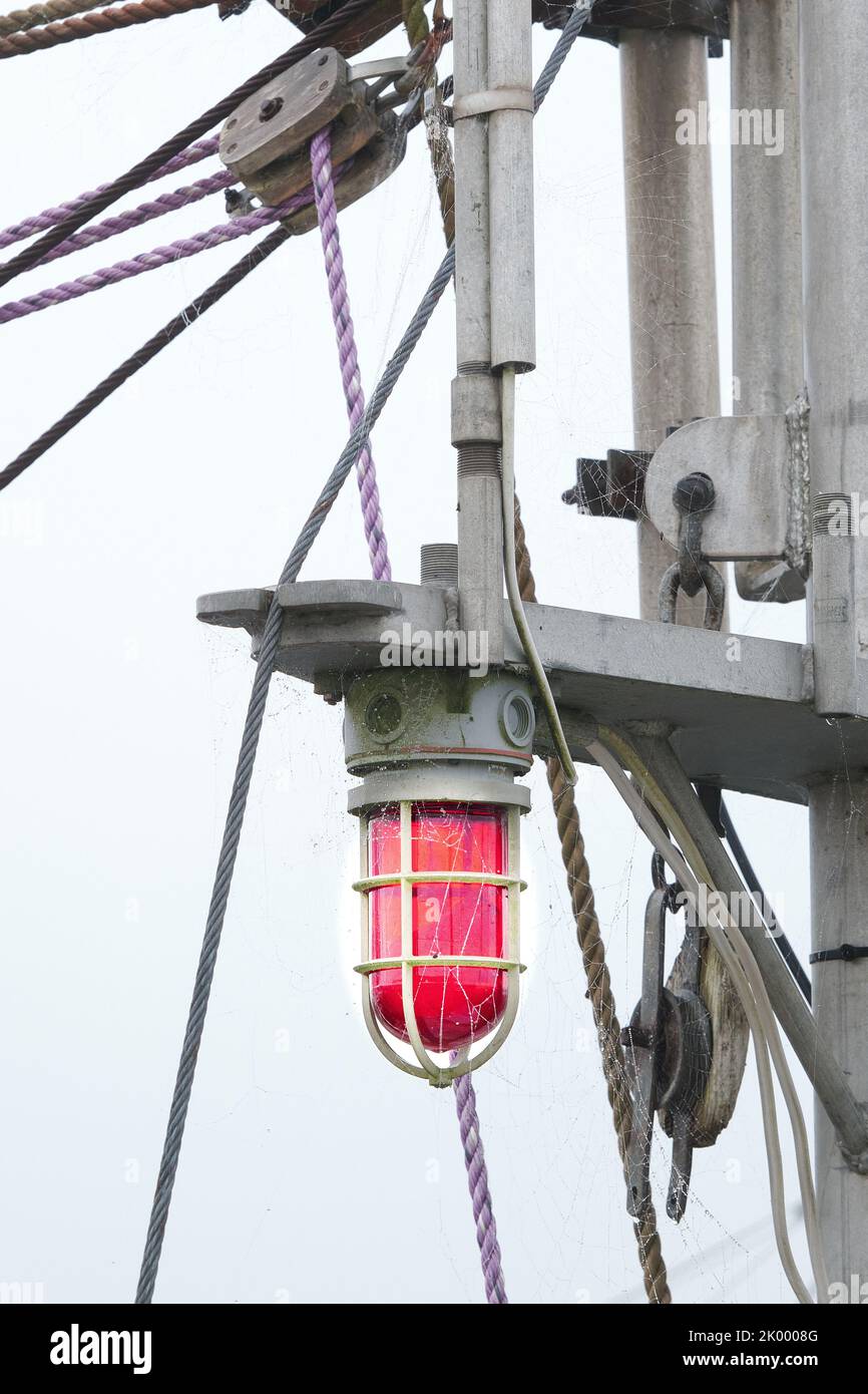 All boats are required to have operational lights called sidelights ,also called combination lights because they are visible to another vessel approac Stock Photo