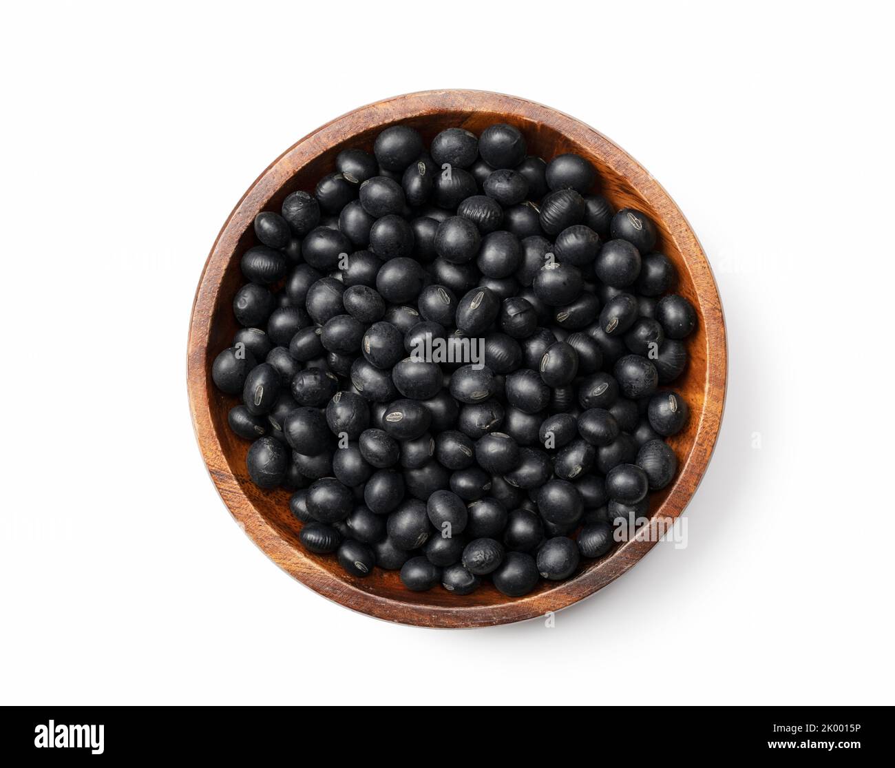 Black soybeans in more of a tree placed on a white background. Black