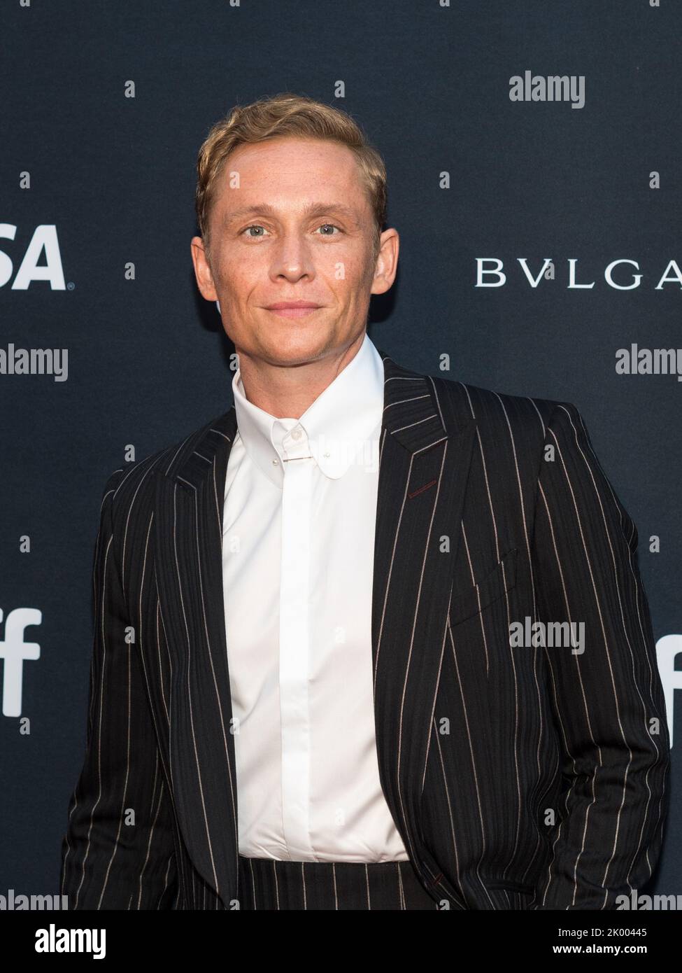 Actor Matthias Schweighofer poses for a photograph on the red carpet