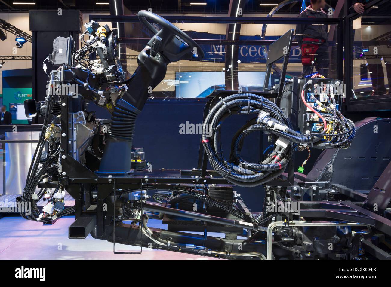 Exposed chassis, engine, gears and motor of a bus on display at the LAT.BUS 2022 exposition