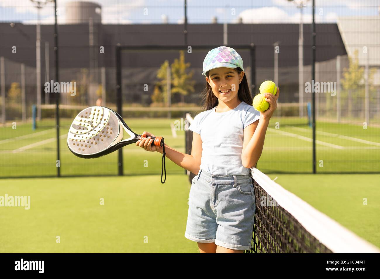 little Girl playing paddle tennis Stock Photo Alamy