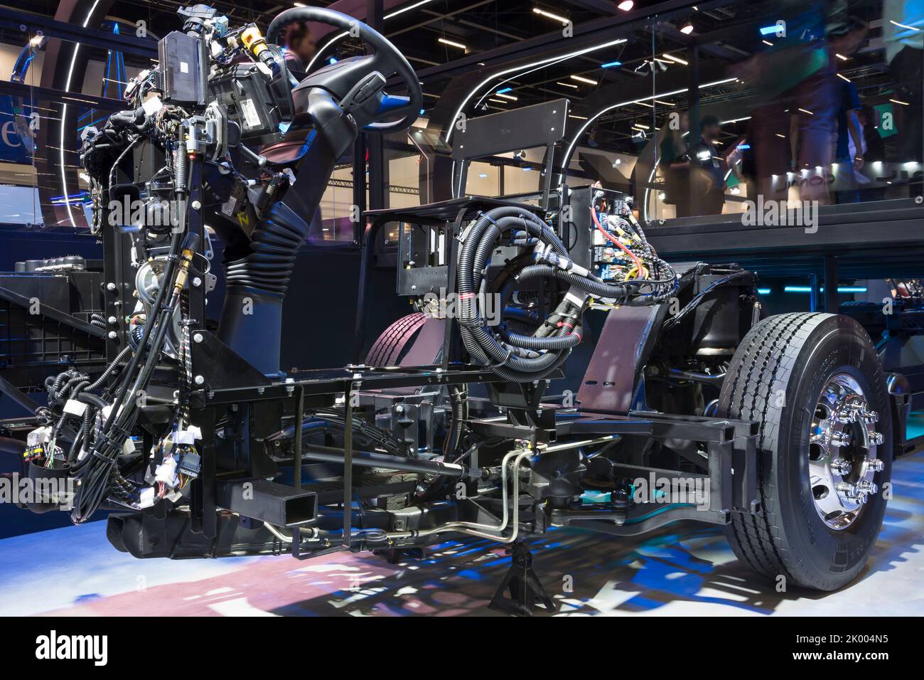 Exposed chassis, engine, gears and motor of a bus on display at the LAT.BUS 2022 exposition