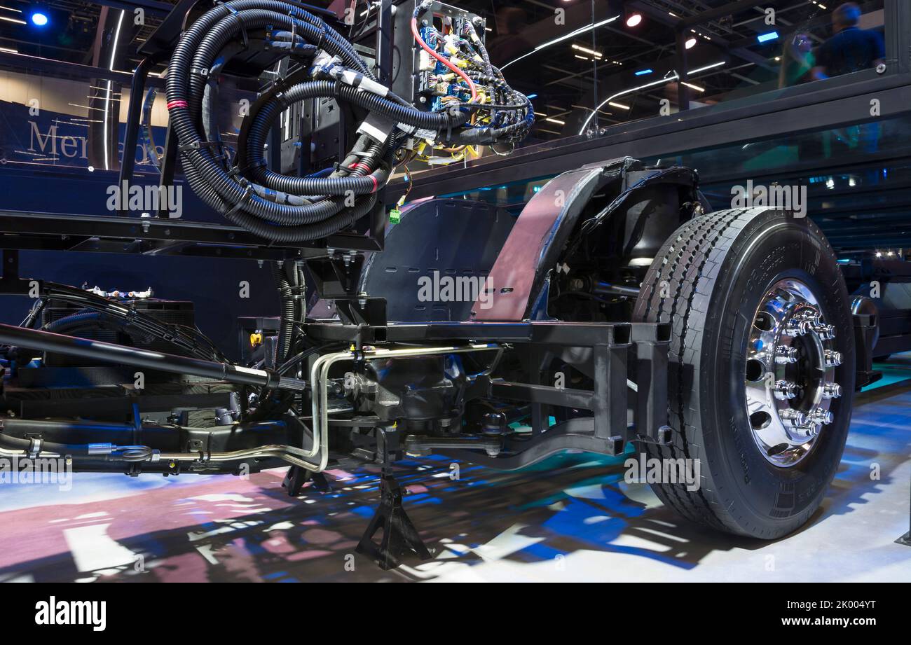 Exposed chassis, engine, gears and motor of a bus on display at the LAT.BUS 2022 exposition