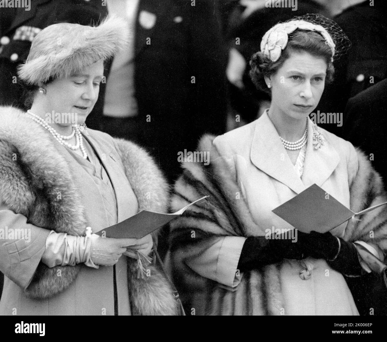 June 2, 1954 - Epsom, England, United Kingdom - (L-R) QUEEN ELIZABETH The  Queen Mother, 53, and her daughter QUEEN ELIZABETH II, 28, discuss the  Queen's horse Landau's chances as they watch