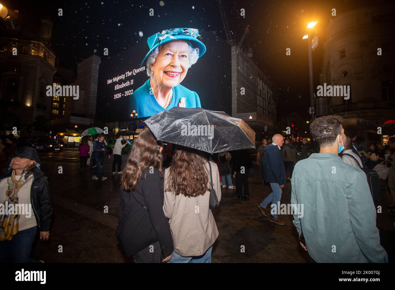 London, England, UK. 8th Sep, 2022. A tributet to Queen Elizabeth II is on display on giant screen in Piccadilly Circus after her death announcement. (Credit Image: © Tayfun Salci/ZUMA Press Wire) Stock Photo