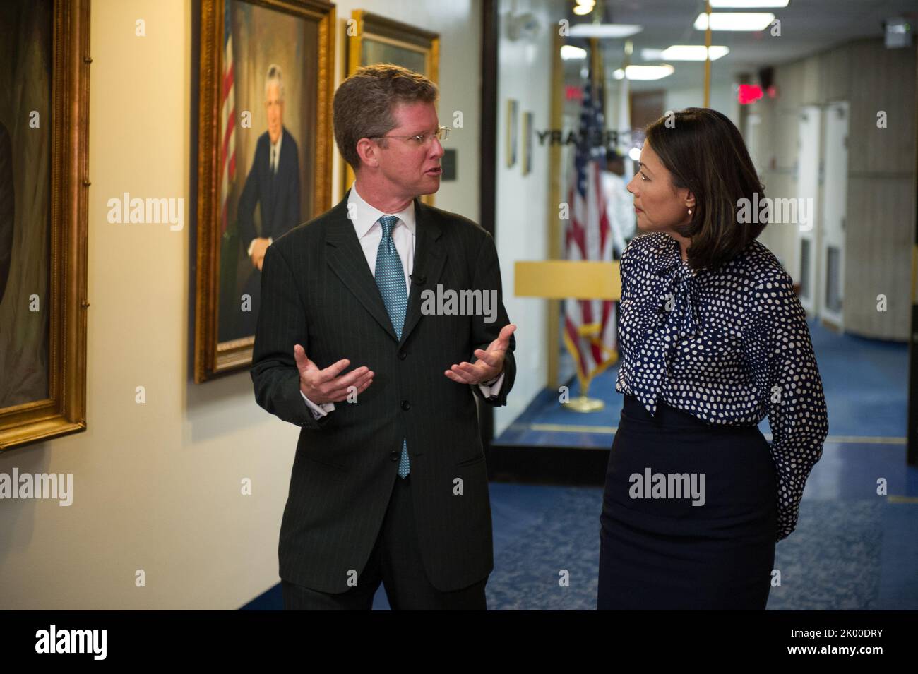 Secretary Shaun Donovan giving interview, tour of HUD headquarters, to NBC's Anne Curry. Stock Photo