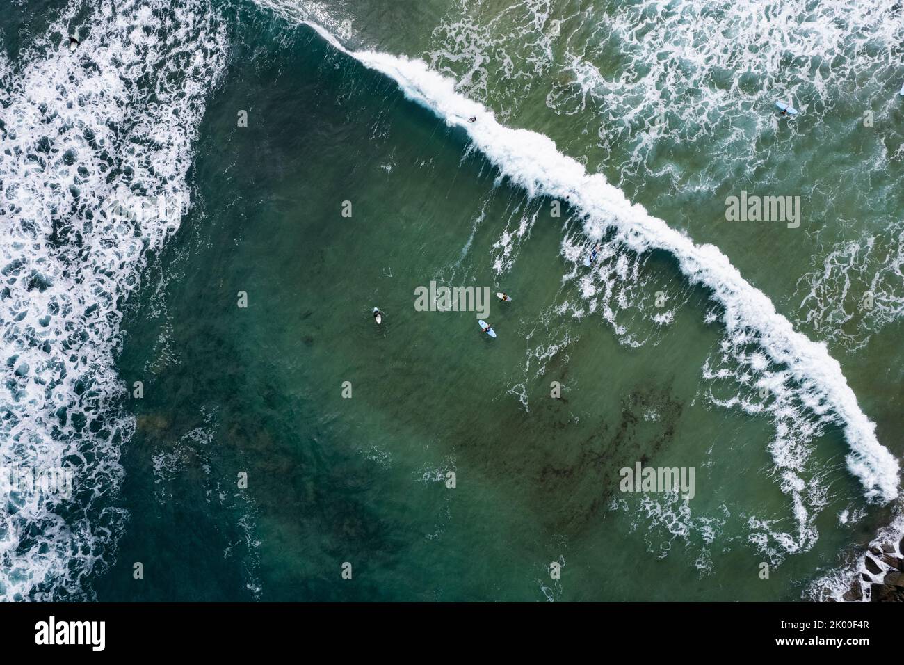 Surfers in Atlantic Ocean , drone photo Stock Photo