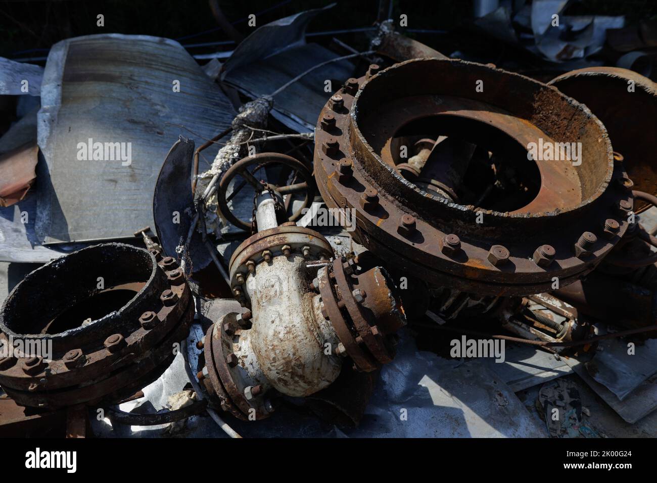 Details with old and rusty industrial metallic objects at a Romanian abandoned power plant. Stock Photo