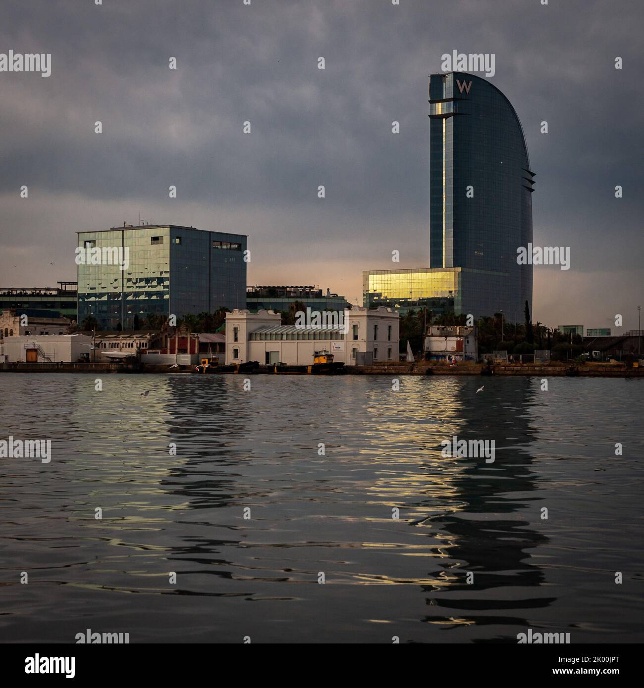 W Hotel (also known as Hotel Vela) designed by Ricard Bofill i Leví, seen from Barcelona's Port Vell Stock Photo
