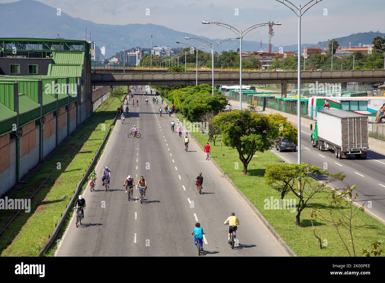 Colombia,Medellin, every sunday one lane of an important two streetthrough the city is closed for cars and and motorised vehicles. Only bicycles and Stock Photo
