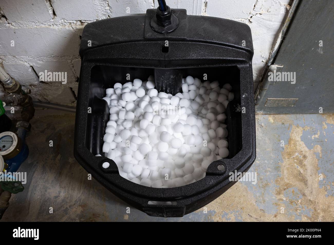 egenerating salt of a water softening and descaler system for water