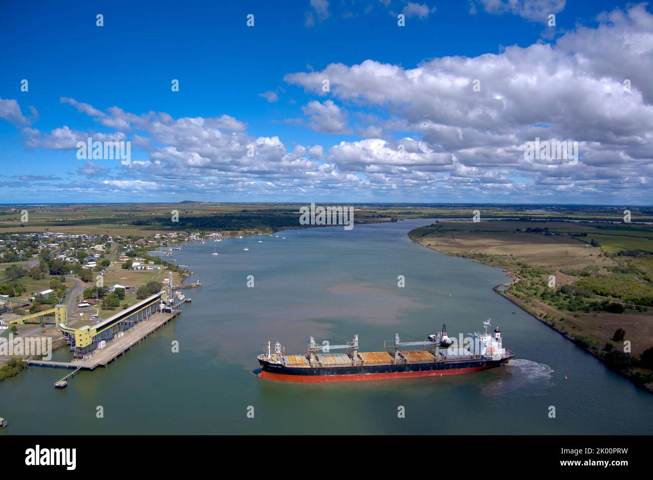 Aerial of bulk carrier Nanaimo Bay departing from the Sugar Terminal on the Burnett River Port Bundaberg Queensland Australia Stock Photo