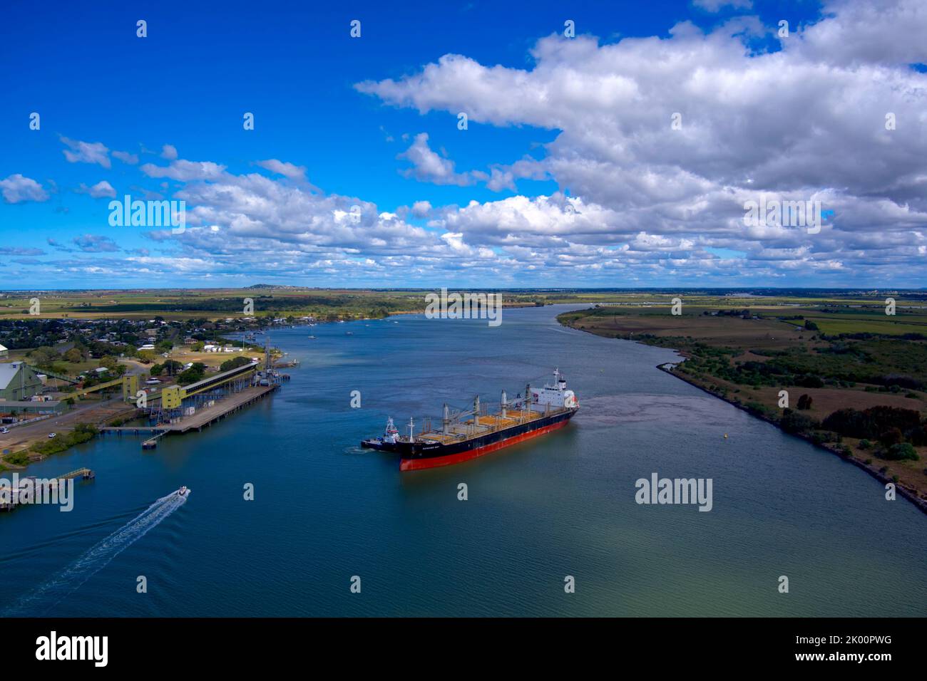 Aerial of bulk carrier Nanaimo Bay departing from the Sugar Terminal on the Burnett River Port Bundaberg Queensland Australia Stock Photo