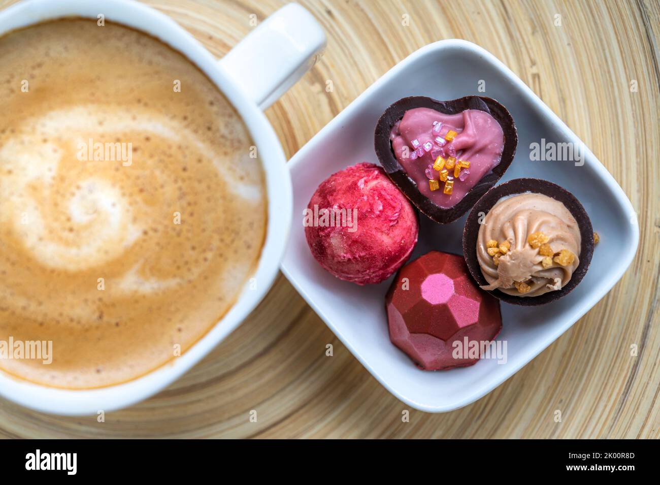 Delicious coffee with homemade chocolates as an enjoyable snack Stock Photo