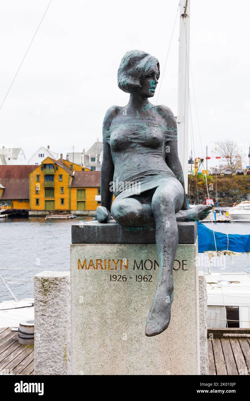 Bronze statue of Marylin Monroe on the quayside. Ancestral home of her