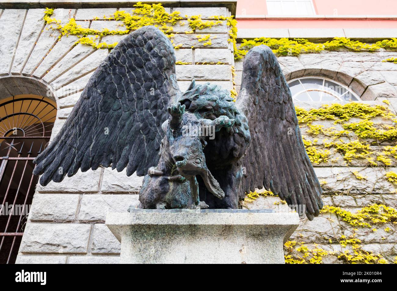 Bronze Eagle and rabbit, ørnefar og ørnemor, on the city hall. Haugesund, Norway Stock Photo