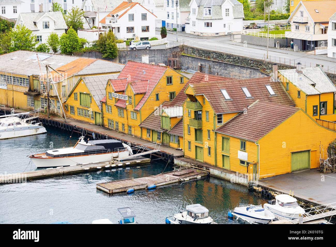 Colourful, traditional wooden warehouses herring canning buildings, now apartments. Sundgata, Haugesund, Norway Stock Photo