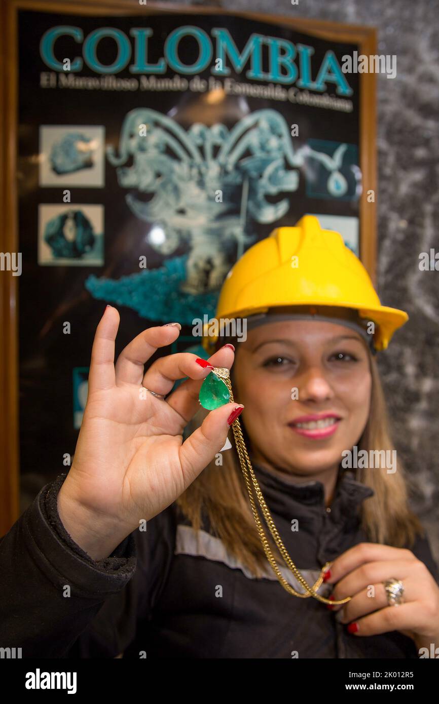 Colombia, Zipaquira, after Brazil, Colombia is the most important producer of emerald stones. Onthe photo a woman dressed like a miner is  selling an Stock Photo