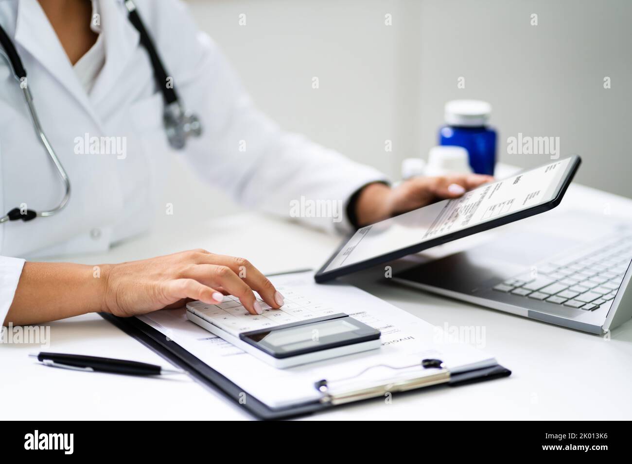 Medical Hospital Bill And Expenses Calculator. Health Money Stock Photo