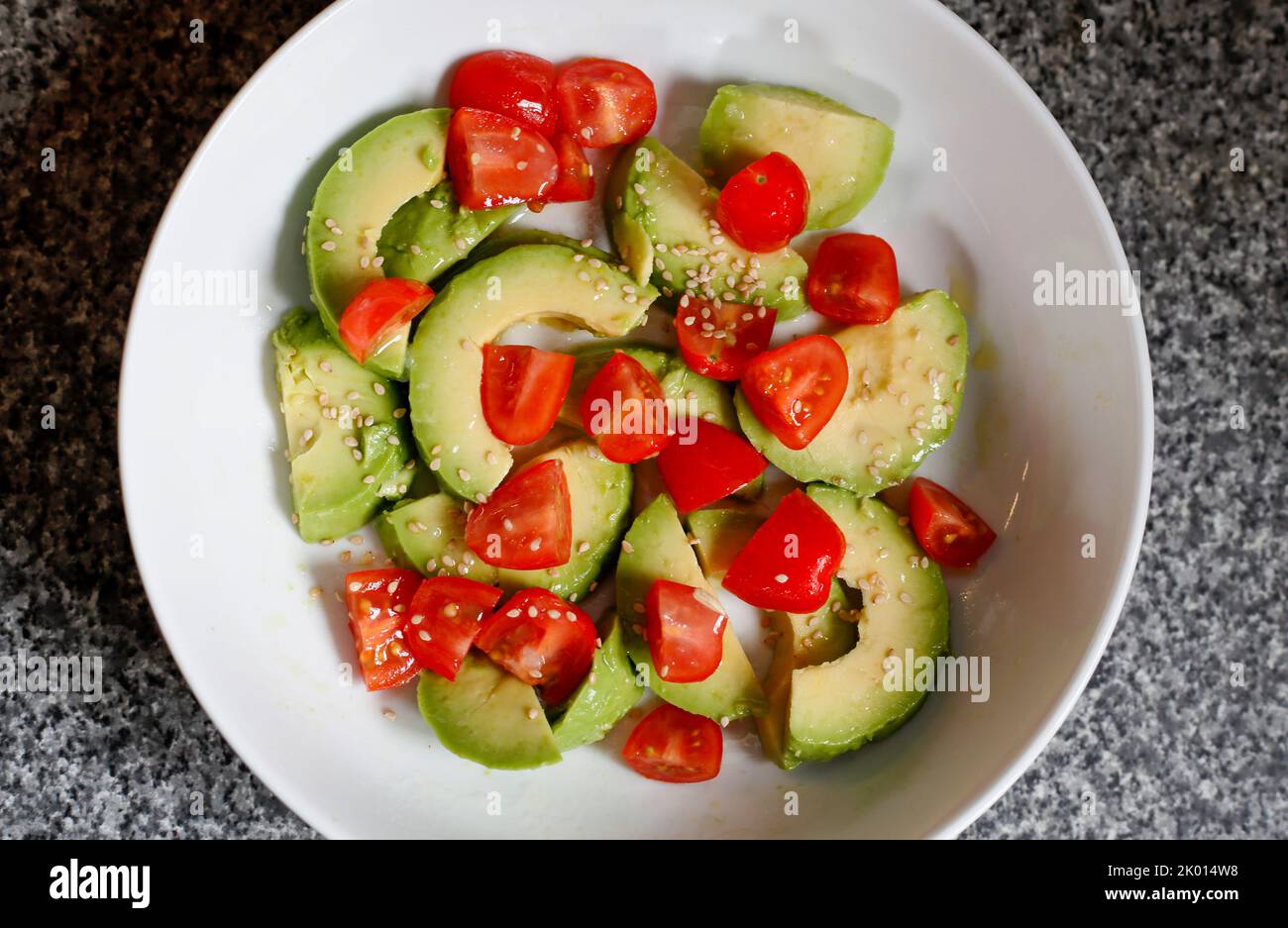 Avocado and tomato salad Stock Photo