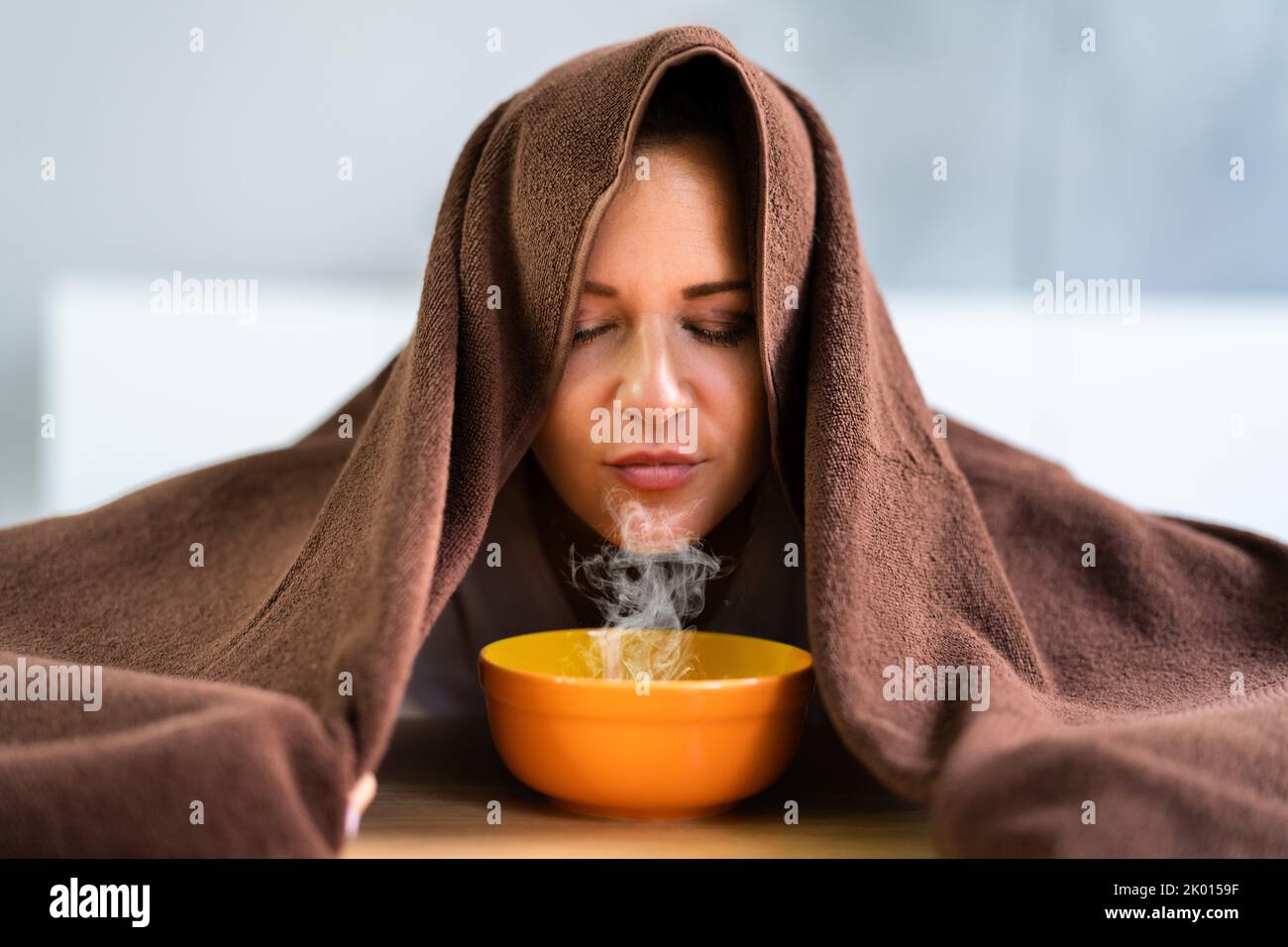 Woman Doing Inhalation Alternative Herbal Medicine Using Steam Bowl