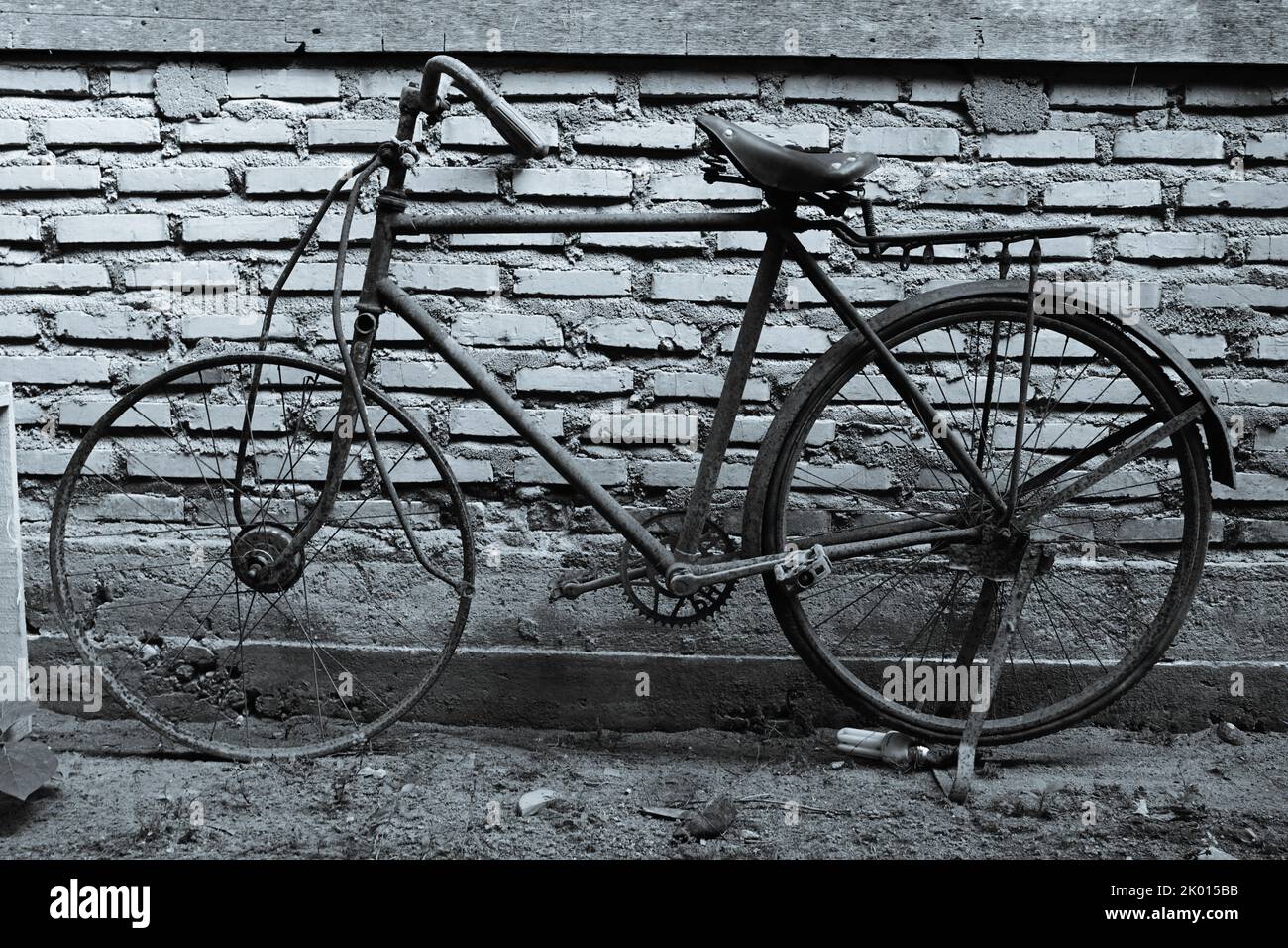 photo of a klasing bike next to a house Stock Photo