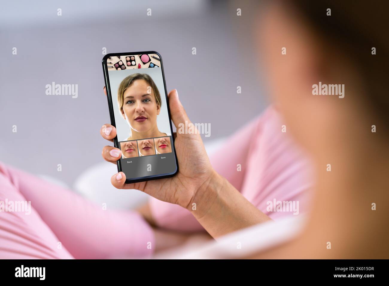 Try Virtual AR Makeup. Woman Using Beauty Digital Technology Stock Photo