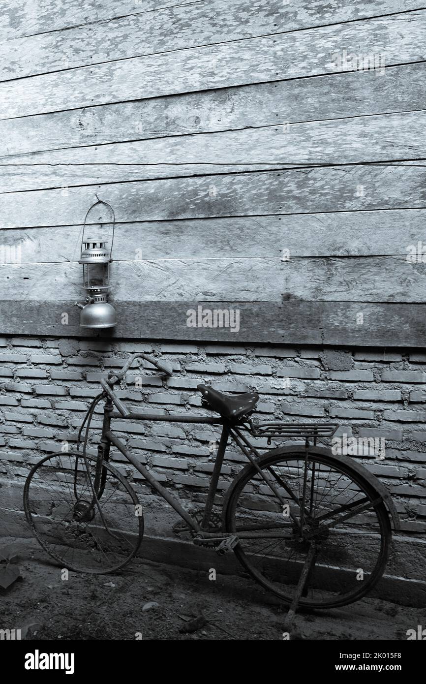 photo of a klasing bike next to a house Stock Photo