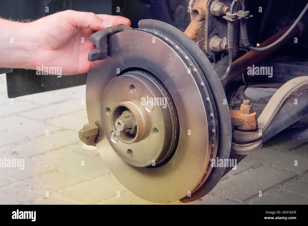 Automobile maintenance concept. Wheel balancing or repair. Cars and transportation repair, close up. Stock Photo