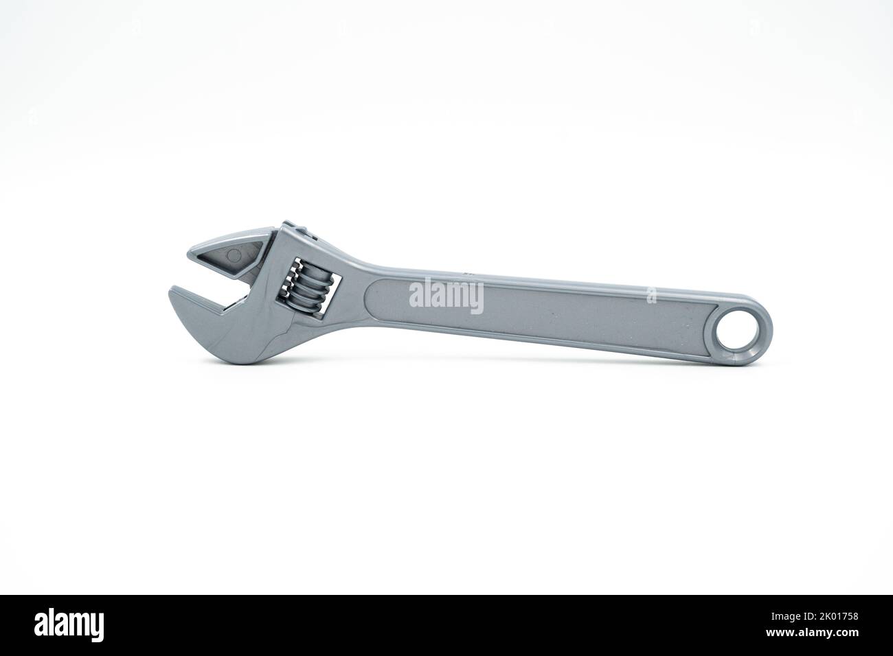 Plastic children's toy gray wrench with adjustable head Stock Photo