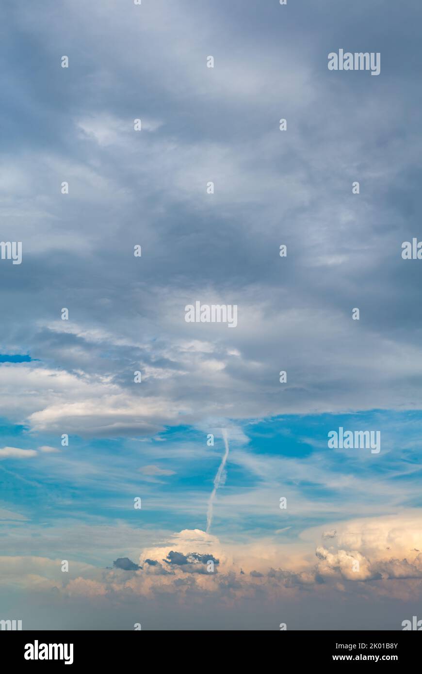 Fantastic clouds at sunrise, vertical panorama Stock Photo - Alamy