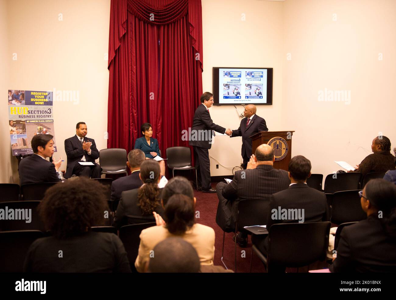 HUD Section 3 Business Registry Launch at the Rayburn Building, Washington, D.C., with HUD Assistant Secretary for Fair Housing and Equal Opportunity (FHEO) John Trasvina, FHEO Economic Opportunity Division Director Staci Gilliam, HUD Washington, D.C. Field Office Director Marvin Turner, D.C. Delegate to Congress Eleanor Holmes Norton, California Congresswomen Judy Chu and Maxine Waters, Missouri Congressman Emanuel Cleaver, Small Business Administration's Historically Underutilized Business Zone (HUBZone) Program Director Grande Lum, and D.C. Department of Housing and Community Development Di Stock Photo