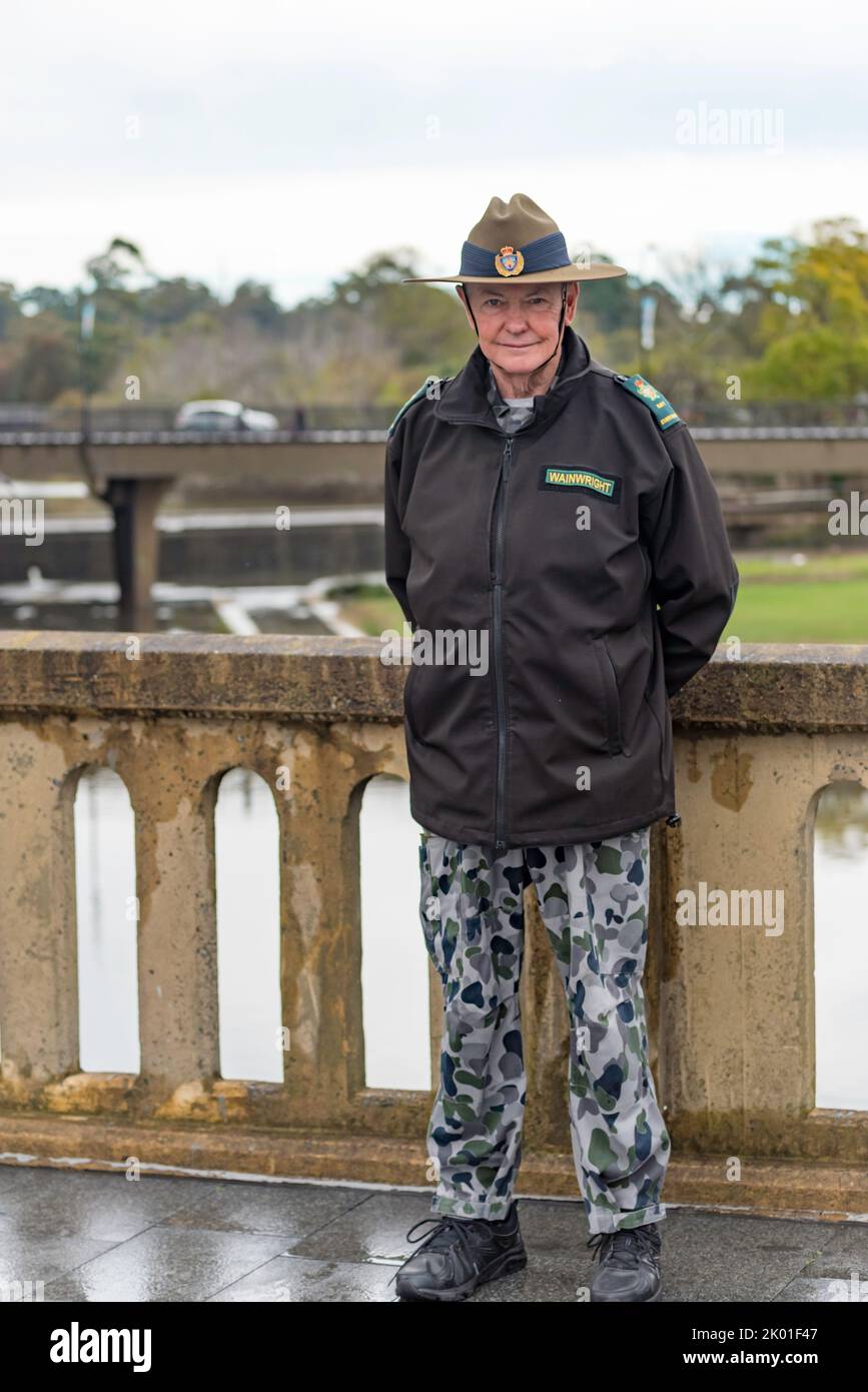 Everyman's Welfare Representative, Chris Wainwright standing on Lennox Bridge over the Parramatta River in the City of Parramatta, Australia Stock Photo