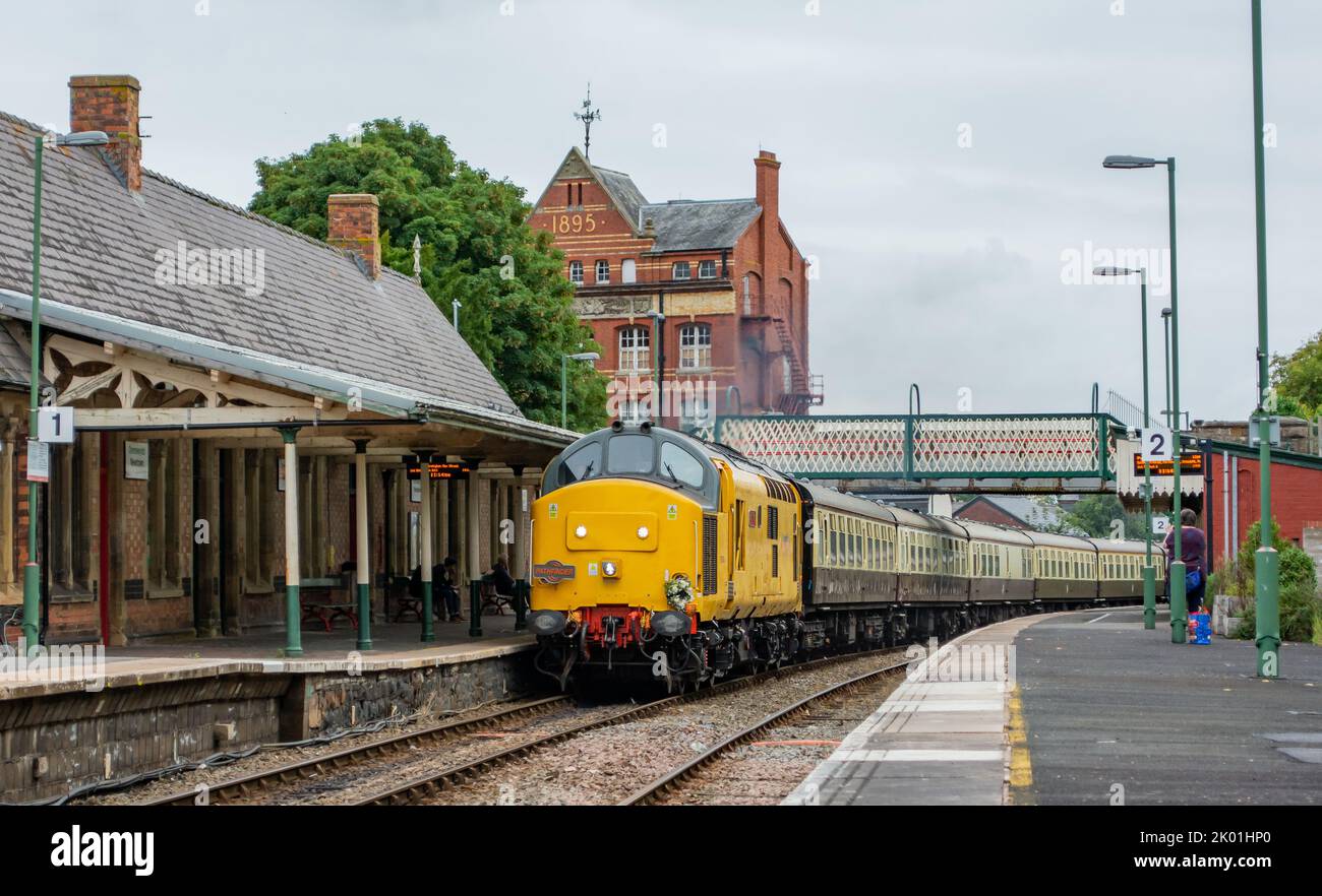 Newtown Powys, Wales, UK; Sept 9 2022: This is the cambrian coast express passing Newtown Powys on route to Pwllheli. The front engine dawning a wreath out of respect to the Queen that passed away the day before. Credit: H18PDW Photography/Alamy Live News Stock Photo