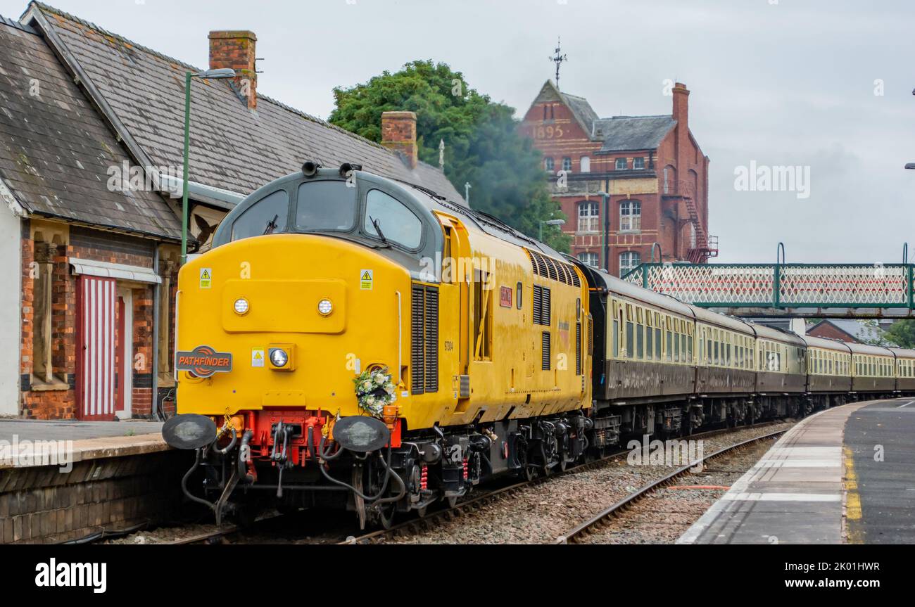 Newtown Powys, Wales, UK; Sept 9 2022: This is the cambrian coast express passing Newtown Powys on route to Pwllheli. The front engine dawning a wreath out of respect to the Queen that passed away the day before. Credit: H18PDW Photography/Alamy Live News Stock Photo