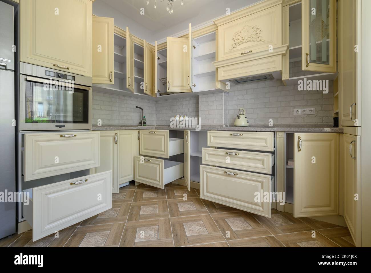 Interior of modern trendy cream colored kitchen Stock Photo