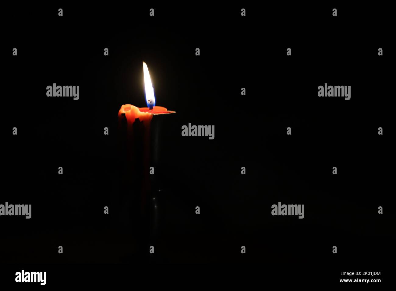 Candle burning in the nightscape Stock Photo
