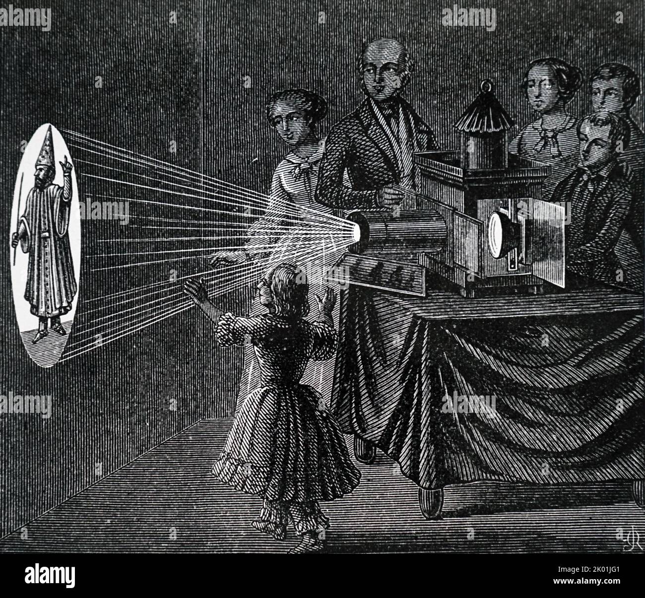 A family enjoying a magic lantern show. The lanterns used differ little from Kircher's in the 17th century, consisting of a metal box with lamp placed in focus of a concave mirror. Stock Photo