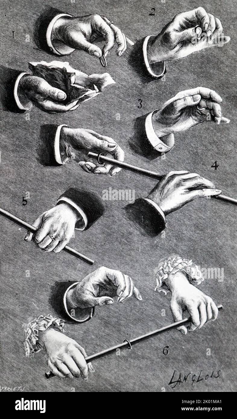 Sleight of hand. Method of vanishing a ring and producing it on a stick. Stock Photo