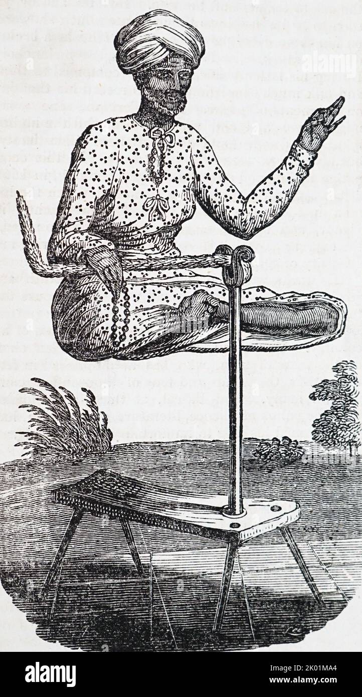The Cuddaph Brahmin, Sheshal, demonstrating sitting in mid-air. Government House, Madras. Stock Photo