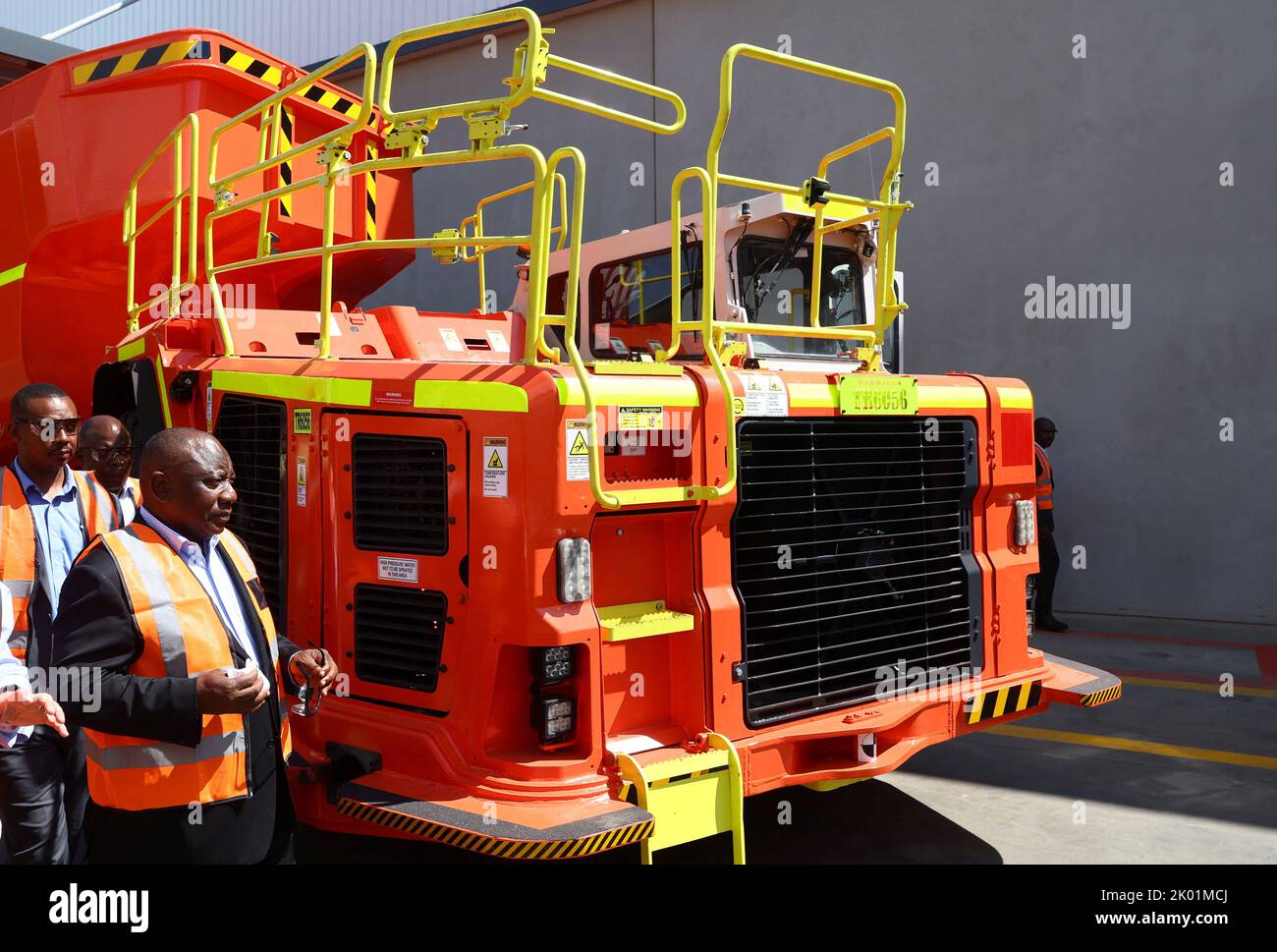 South Africa's President Cyril Ramaphosa walks past a mining truck during the launch of the new Sandvik Khomanani manufacturing site, at Khomanani, in Kempton Park, Johannesburg, South Africa September 9, 2022. REUTERS/Siphiwe Sibeko Stock Photo