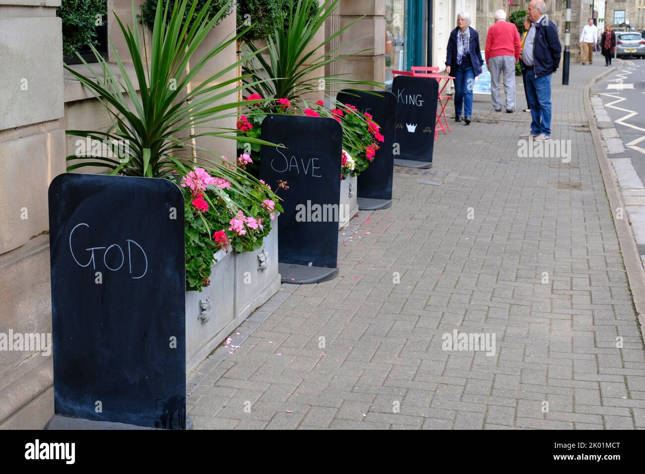Tetbury, UK. 9th Sep, 2022. Flags are lowered in this small Cotswold town. King Charles III, owns a country home at nearby Highgrove. God save the King signs. Credit: JMF News/Alamy Live News Stock Photo