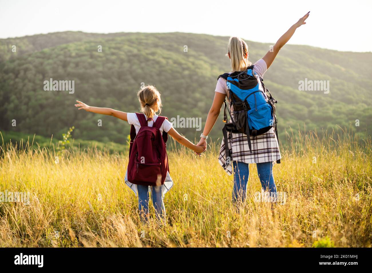 Child arms raised nature hi-res stock photography and images - Alamy