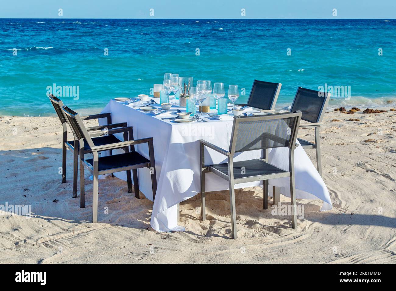 Dinner on a sandy beach Stock Photo
