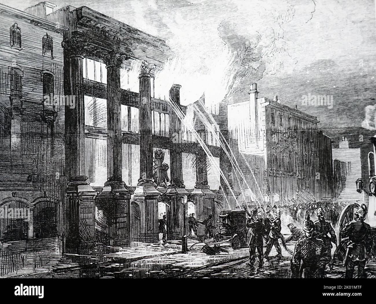Members of the London Fire Brigade fighting a fire in a coach builders' workshops in Oxford Street near Hannover Square. Stock Photo
