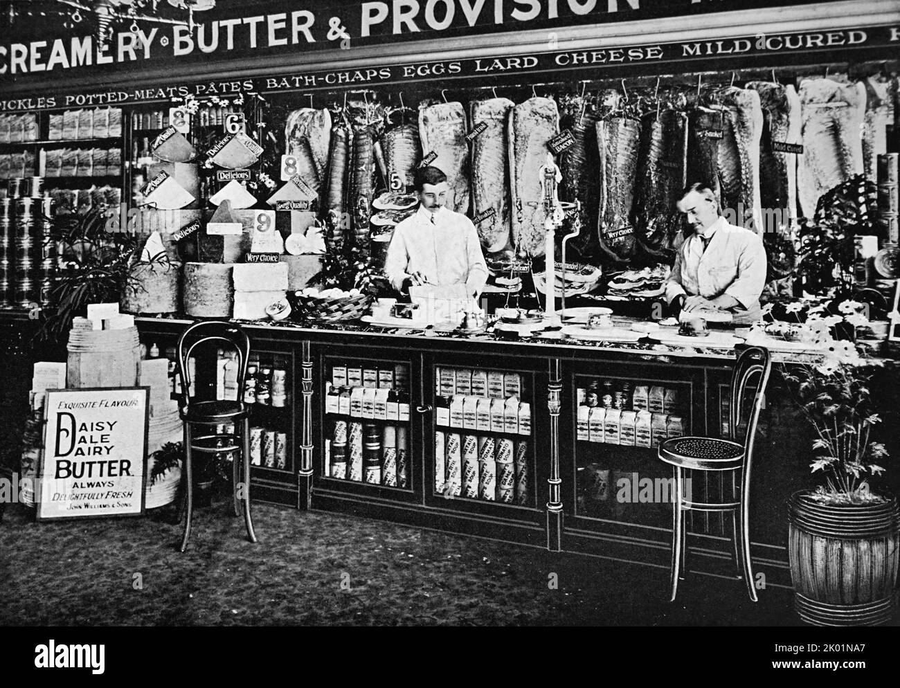 Provision counter showing cleanliness of both staff and goods on offer. Stock Photo