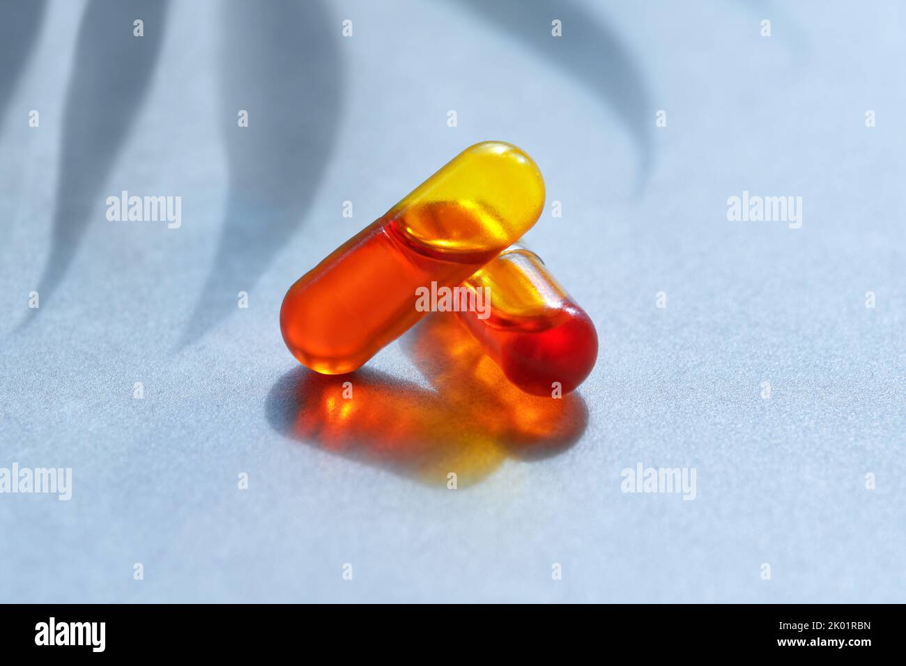 Curcumin in liquid form. Herbal capsules, herb turmeric capsules on